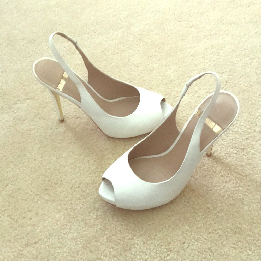 Marciano white peep toe pumps